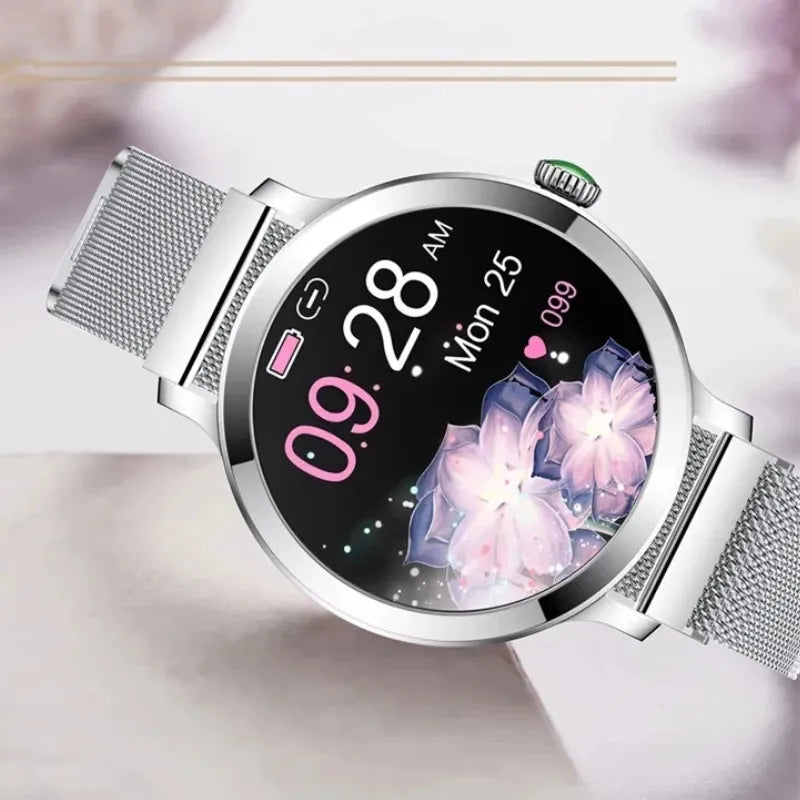 Smartwatch feminino prata com tela AMOLED, pulseira em aço fino e monitoramento de saúde completo.