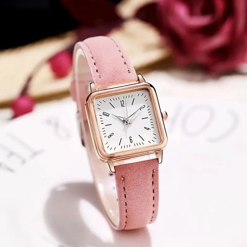 Relógio feminino minimalista com pulseira de couro rosa e mostrador branco