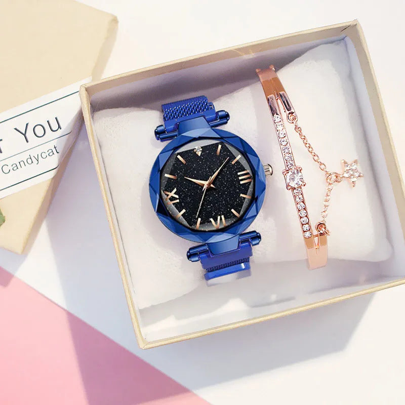 Relógio feminino azul com mostrador céu estrelado e pulseira moderna.