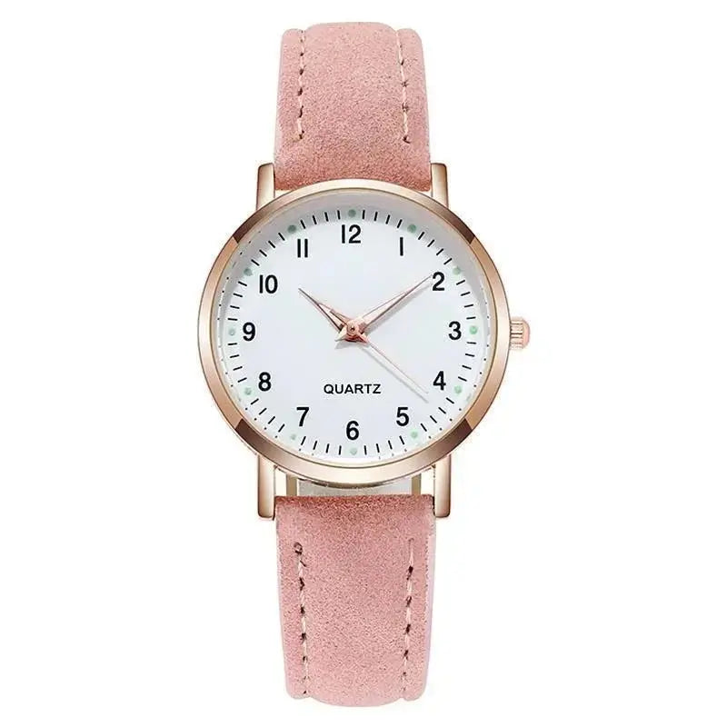 Relógio feminino retrô rosa claro com pulseira de couro sintético e mostrador luminoso.