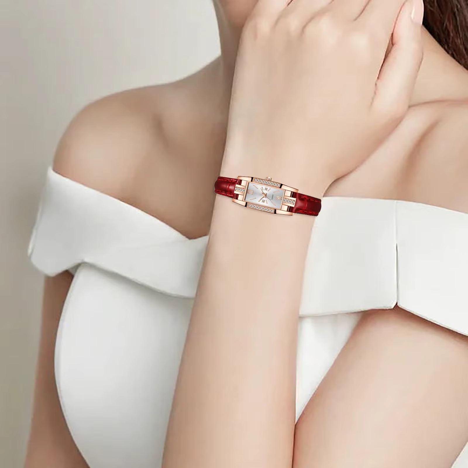 Relógio feminino vintage pulseira vermelha com mostrador branco e strass na caixa retangular.