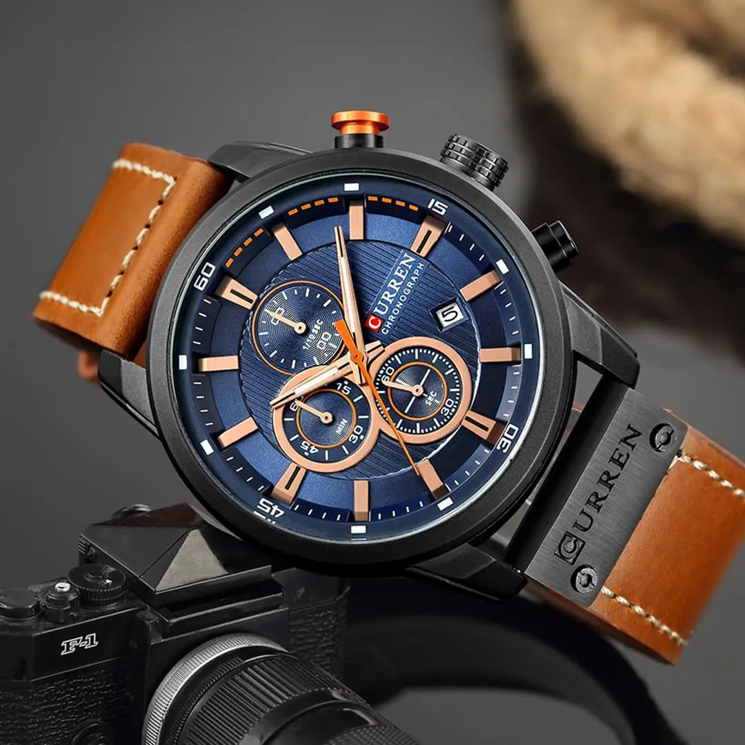 Relógio masculino Chronos com visor azul, cronógrafo e pulseira de couro marrom