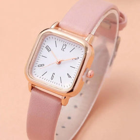 Relógio feminino minimalista com pulseira de couro rosa e mostrador branco