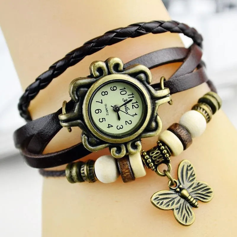 Relógio vintage preto feminino com couro trançado e pingente de borboleta