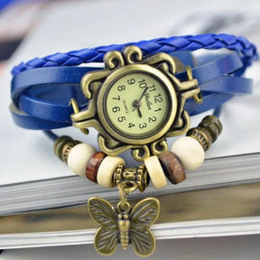 Relógio vintage azul com couro trançado e pingente borboleta feminino