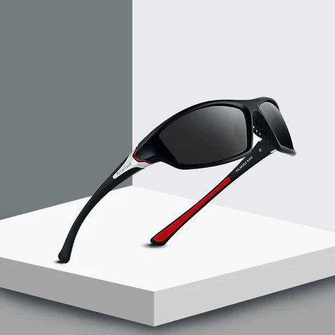 Óculos de sol esportivo polarizado preto com detalhe vermelho e proteção UV
