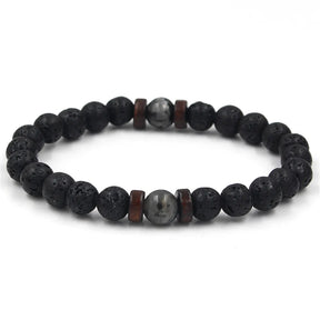 Pulseira masculina com pedras vulcânicas pretas e detalhes em madeira natural, estilo tibetano e rústico
