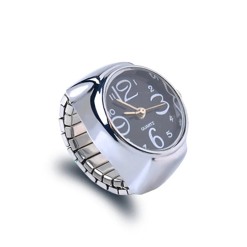 Anel-Relógio Quartzo Preto com mostrador circular e pulseira ajustável prateada