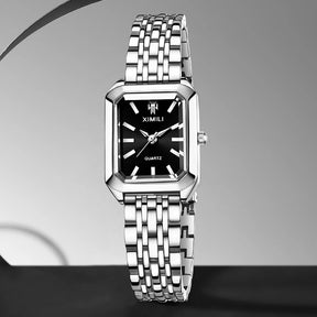 Relógio Ximili preto Feminino prateado com pulseira clássica no pulso
