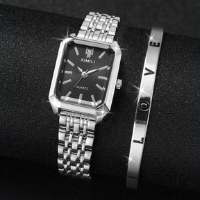 Relógio Ximili preto Feminino prateado com pulseira clássica no pulso