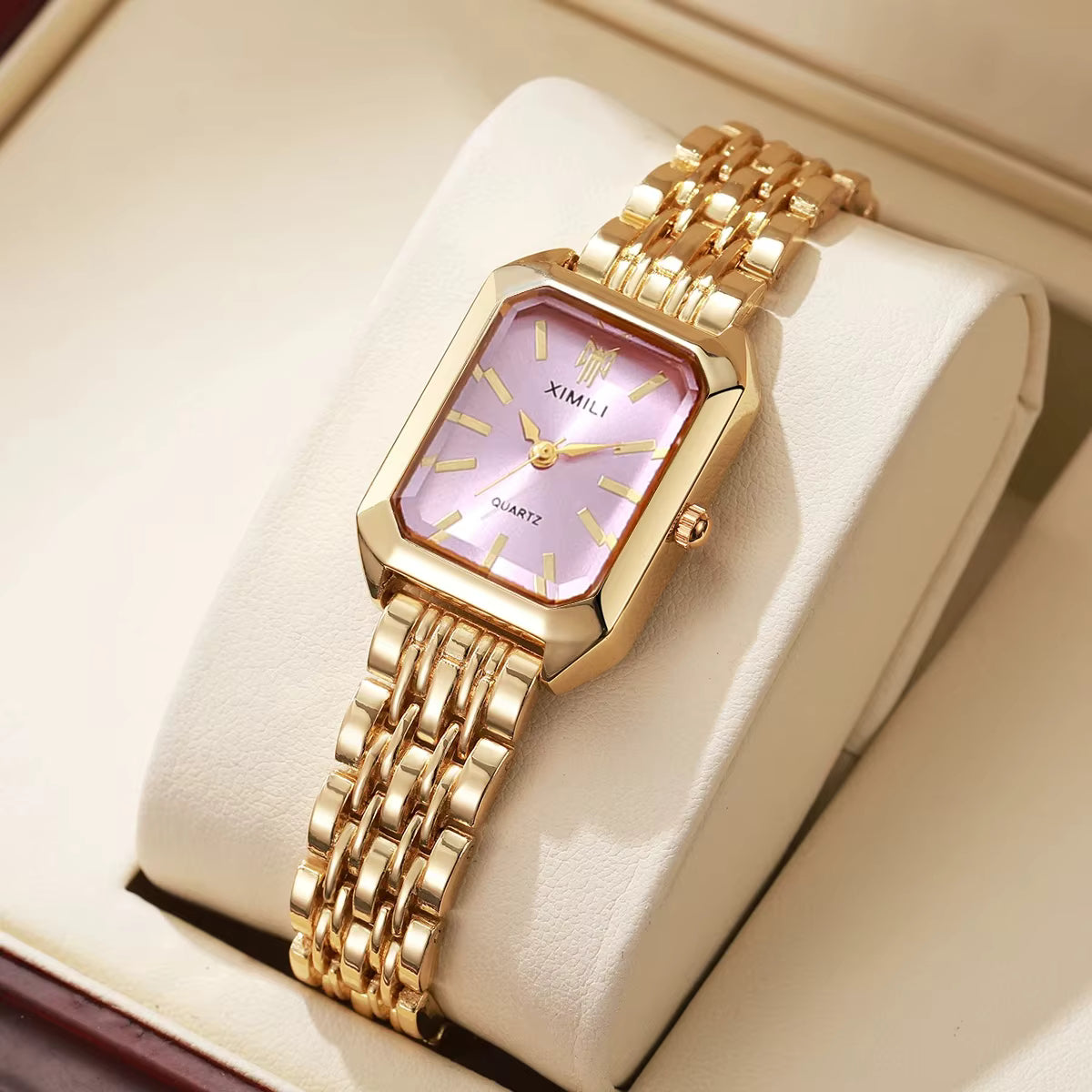 Relógio feminino rosa com mostrador clean e pulseira elegante