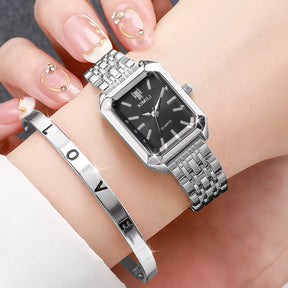 Relógio Ximili preto Feminino prateado com pulseira clássica no pulso