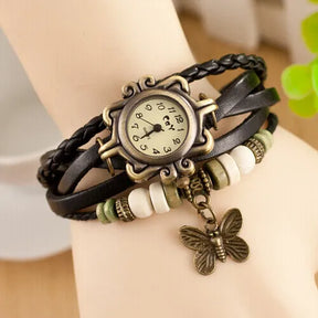 Relógio vintage preto feminino com couro trançado e pingente de borboleta