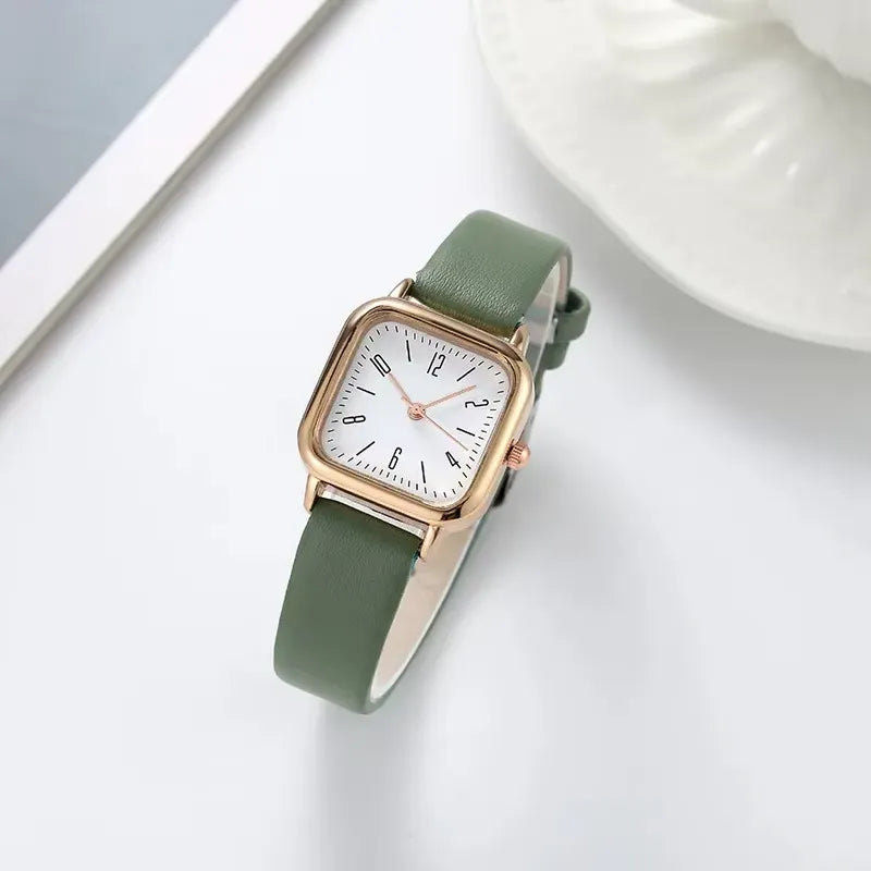 Relógio feminino minimalista com pulseira de couro verde e mostrador branco