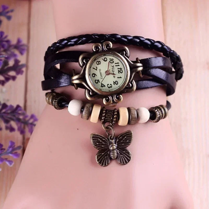 Relógio vintage preto feminino com couro trançado e pingente de borboleta