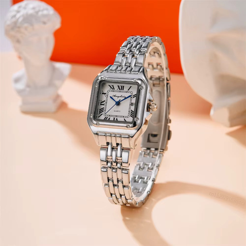 Relógio feminino GREALY prata com mostrador romano e pulseira aço inox.