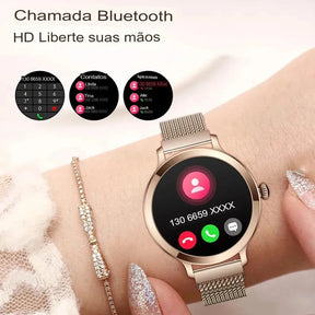 Smartwatch feminino dourado com tela AMOLED e pulseira de aço fino, design elegante e funções de saúde.
